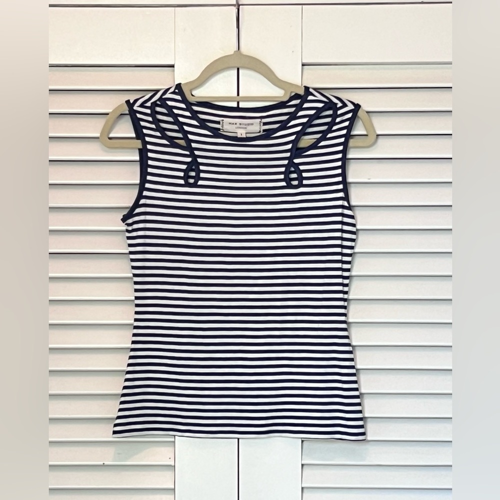 Max Studio top with cut out embellishments. Never worn.